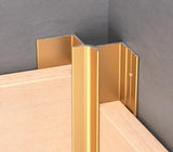 Gold 3mm aluminum inside corner trim fitted between two panels at an interior wall corner
