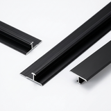 Three black aluminum alloy seamless connection H trim profiles on a white background