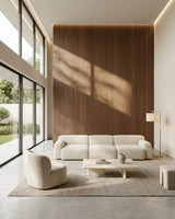Walnut wood veneer feature wall in a bright modern living room with white seating
