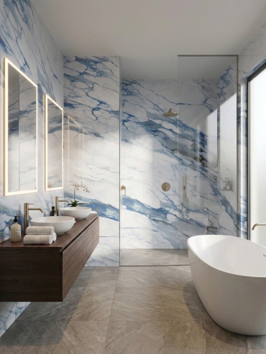 Calacatta Azur marble-look PVC panels covering bathroom walls around a glass shower and freestanding tub