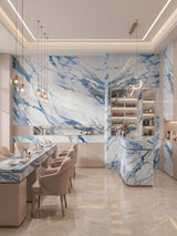 Modern salon interior with counters and walls clad in blue-veined Calacatta Azur PVC panels