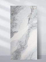 Upright 4 x 8 ft Frosted Sky PVC wall panel with a white marble look and flowing gray veining