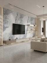 Modern living room with a TV mounted on a white and gray Frosted Sky marble-look panel wall