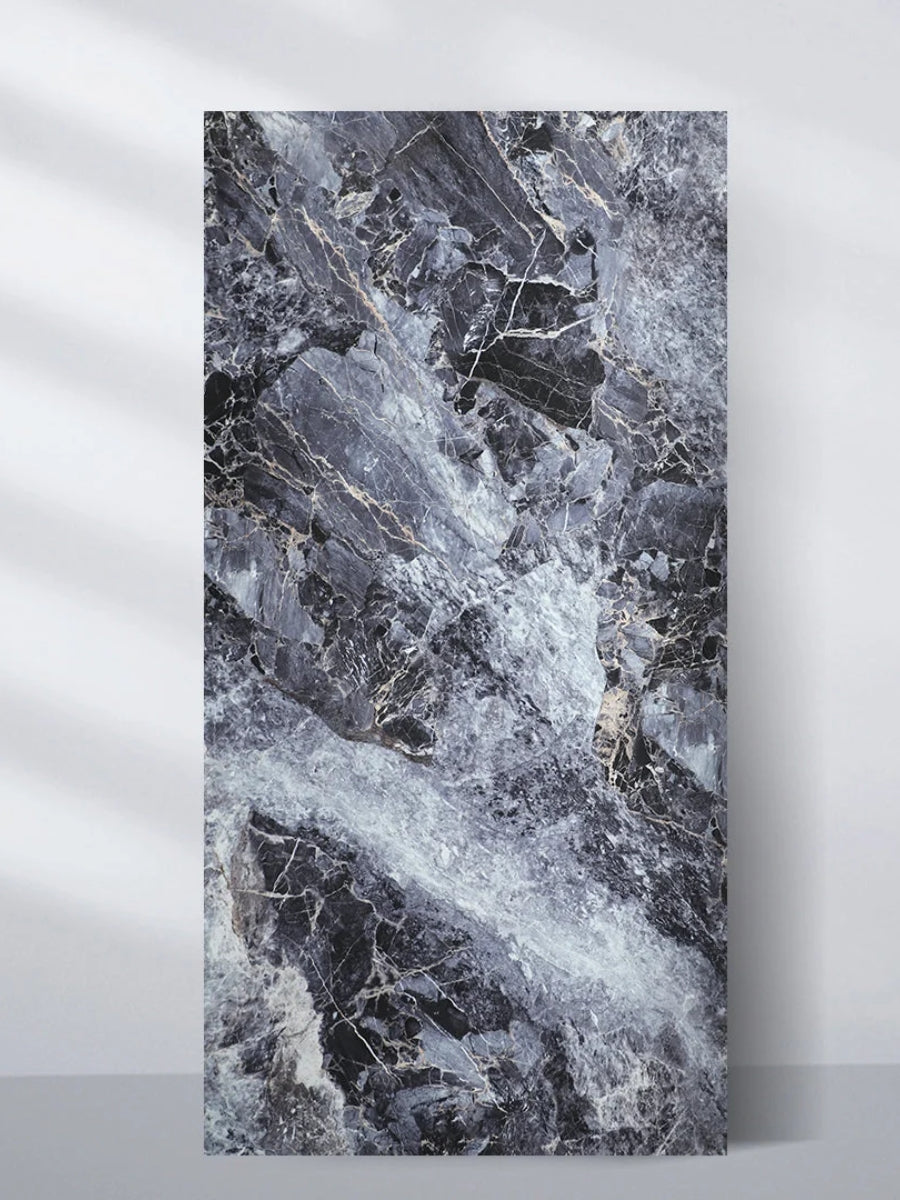 3D Zena black marble PVC wall panel in a 4 x 8 ft sheet with bold gray, white, and gold veining