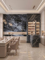 Contemporary dining and bar area featuring Zena black marble PVC wall panels with bold gray veining