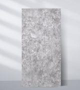 PVC marble sheet sample with a mottled light and medium gray stone pattern