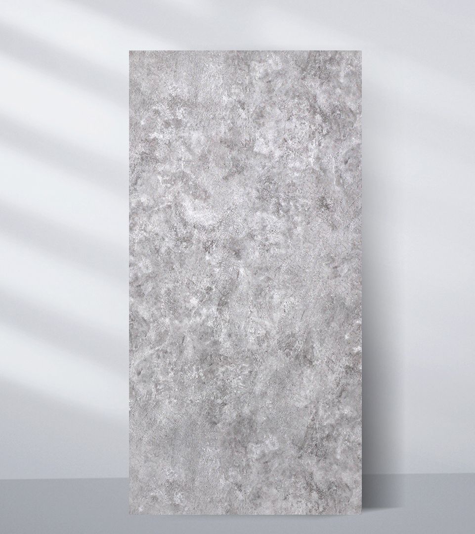 PVC marble sheet sample with a mottled light and medium gray stone pattern