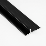 Close-up of black aluminum alloy seamless connection H trim with raised center profile