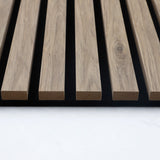 End view showing the wood slat profiles and black sound-absorbing panel backing