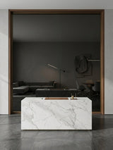 Large Black Mirror wood veneer panel framed in dark wood behind a white marble reception desk