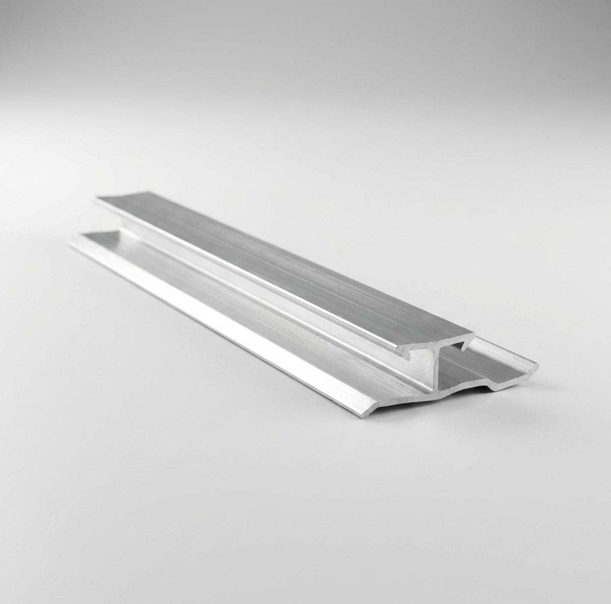 Angled view of the aluminum invisible seamless trim connector for wood veneer panels