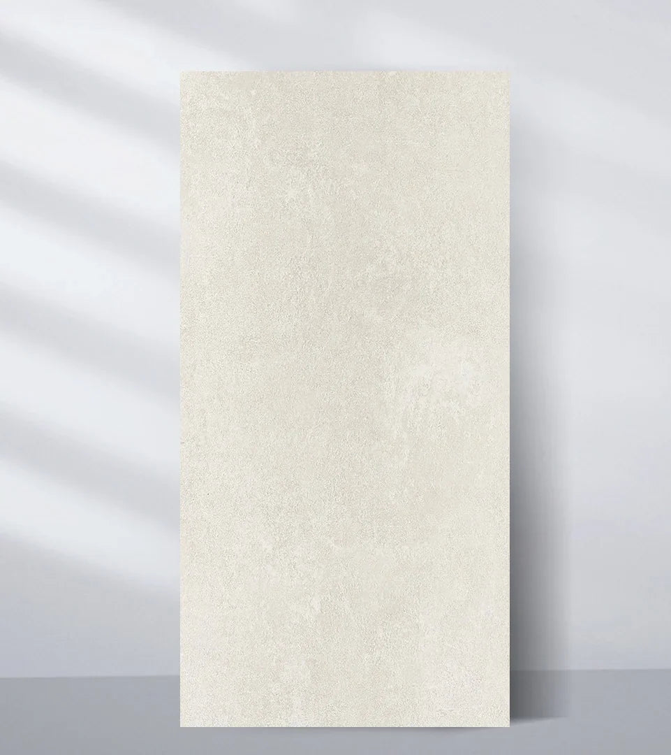 PVC marble sheet sample in warm off-white with a fine, evenly textured finish