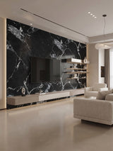 Black and white marble PVC wall panels installed as a TV accent wall in a modern living room
