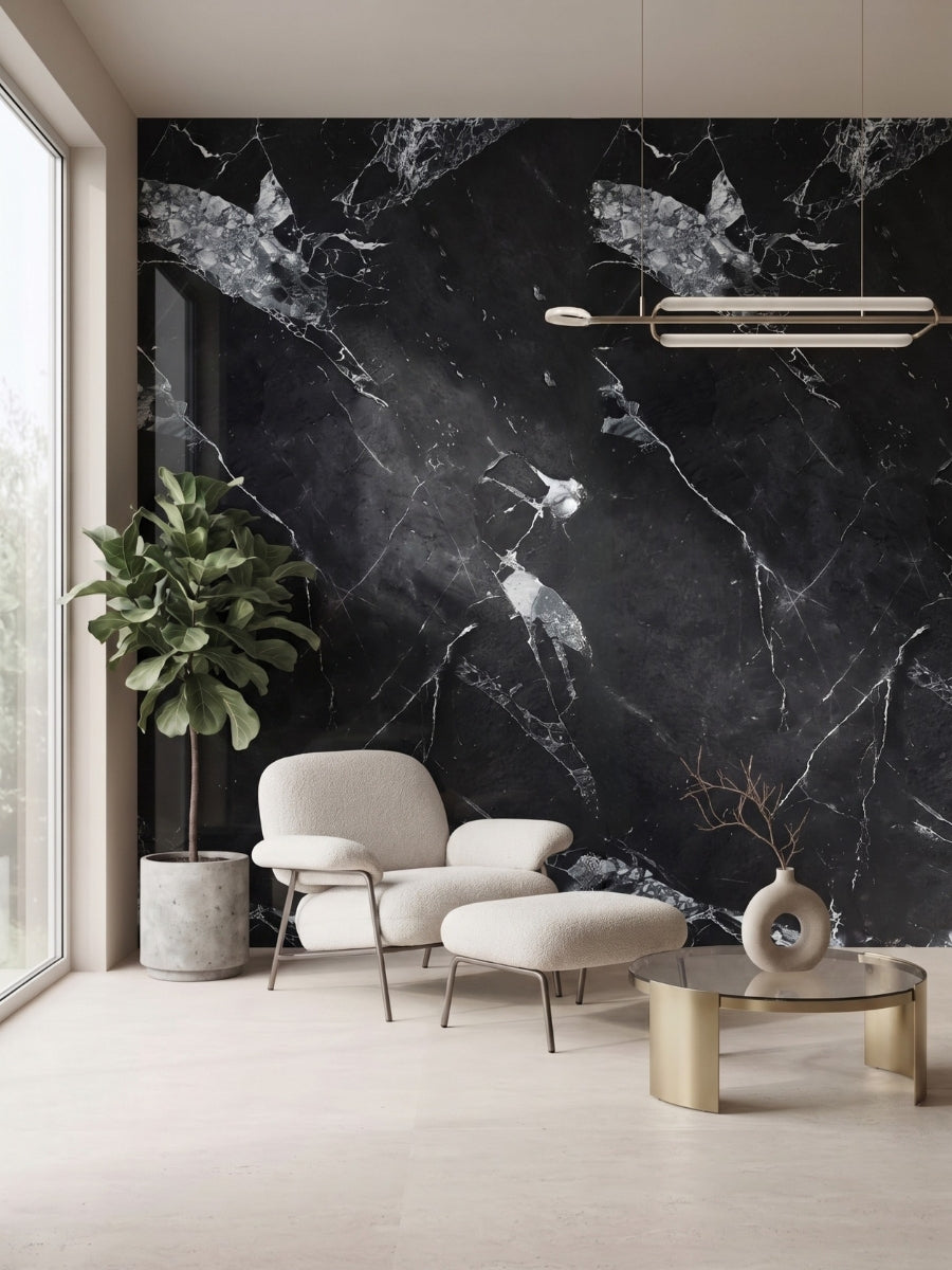 Black and white marble PVC wall panel accent wall behind a lounge chair and ottoman