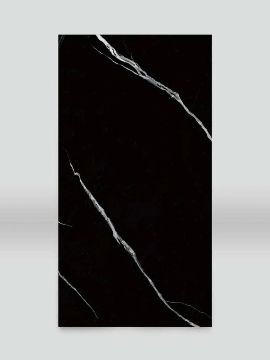 Single 4 x 8 ft Deep Black Marble PVC wall panel with sweeping white veining