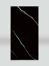 Single 4 x 8 ft Deep Black Marble PVC wall panel with sweeping white veining
