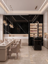 Deep Black Marble PVC wall panels installed in a bright salon with manicure tables and display shelves