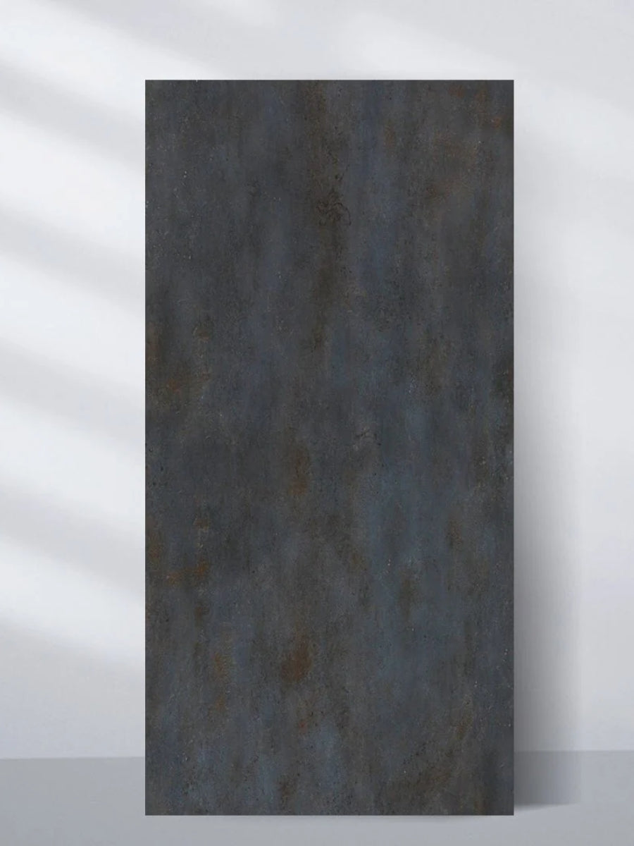 Single dark charcoal PVC stone panel with rough blue-gray and rust-mottled texture