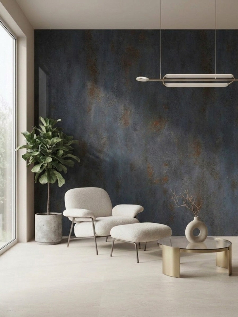 Dark charcoal rough-texture stone panels installed as an accent wall in a modern sitting area