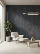 Dark charcoal rough-texture stone panels installed as an accent wall in a modern sitting area