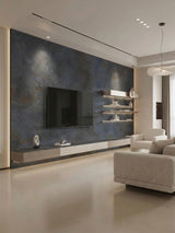 Dark charcoal PVC stone panels installed on a modern living room TV wall