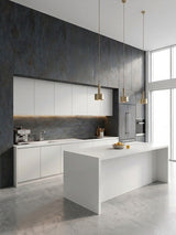 Dark charcoal stone panels covering the walls and backsplash of a modern white kitchen