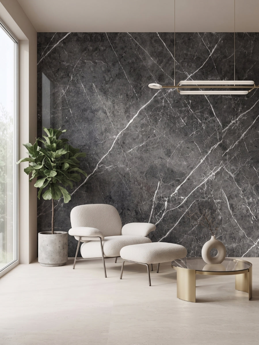 Dark gray marble PVC wall panel accent wall behind a lounge chair and ottoman