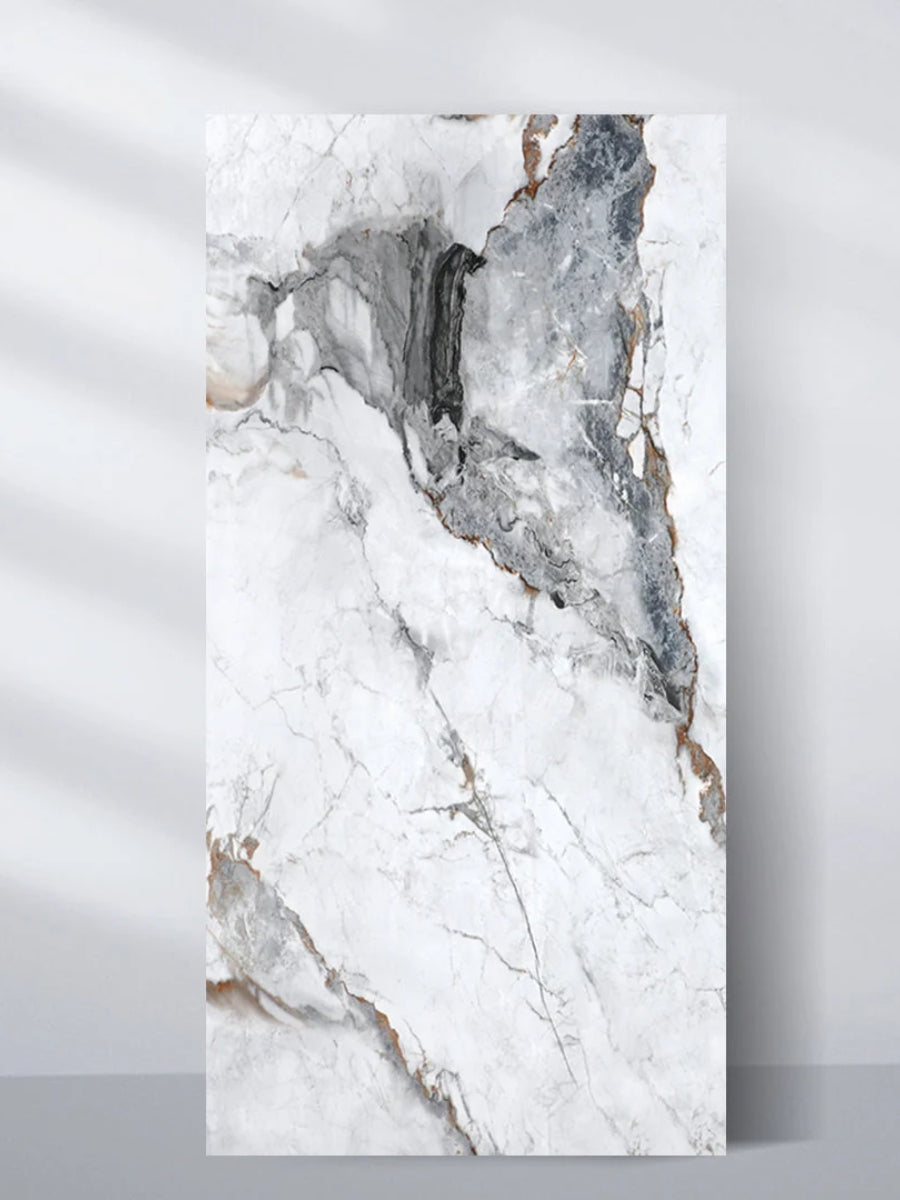 Upright 4 x 8 ft PVC wall panel with a white marble look and bold gray and brown veining