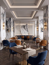 Restaurant interior with gray and brown veined marble-look PVC panels cladding the walls and columns