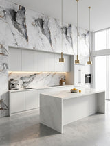 Modern white kitchen with gray and brown veined marble-look PVC wall panels and backsplash