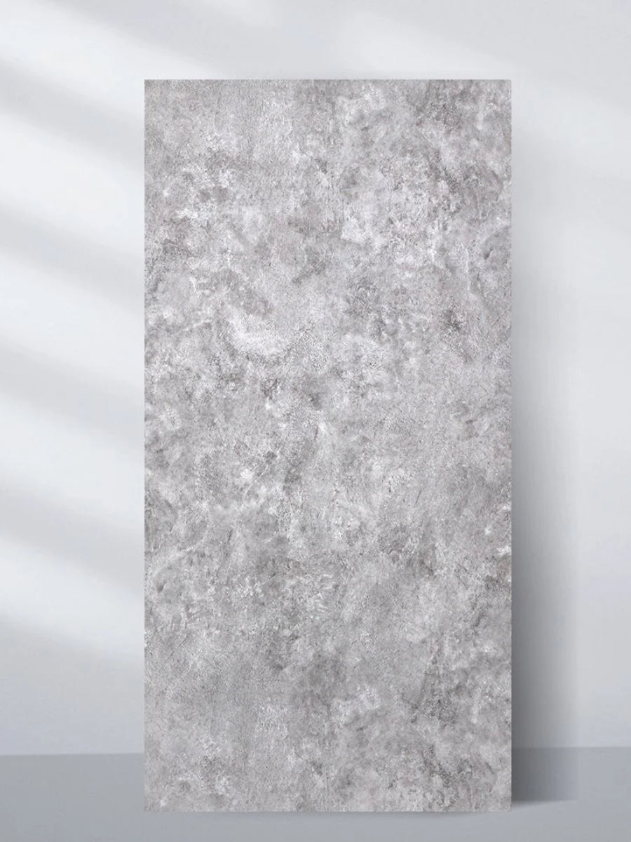 Freestanding gray stone-look PVC sheet with a mottled rough texture