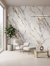 White Luxe Gold Vein Marble PVC wall panels creating an accent wall behind a lounge chair and ottoman