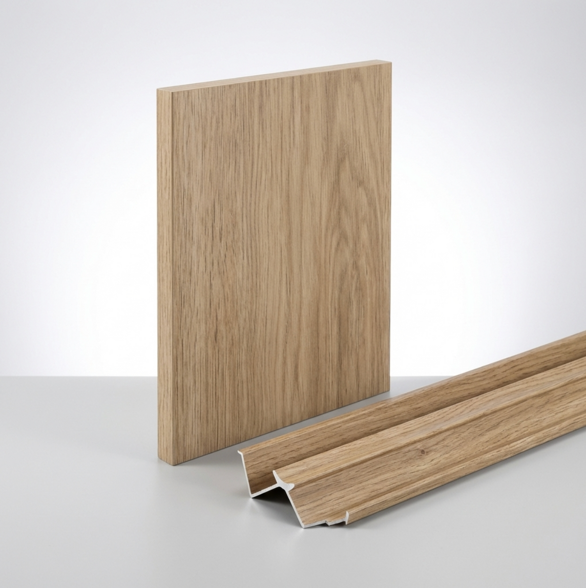 White oak veneer wall panel displayed upright with coordinating wood-grain trim profiles