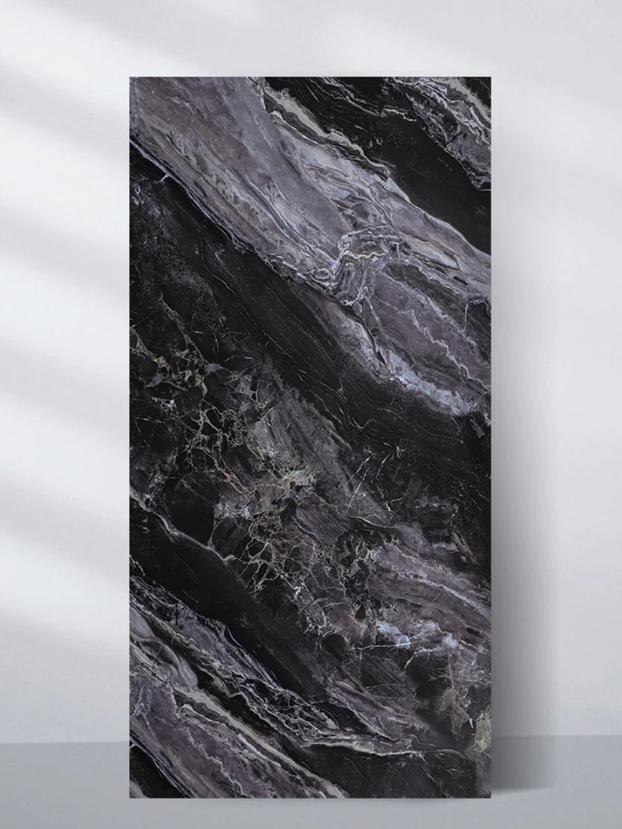 Upright Noir Vein Marble PVC wall panel with sweeping black, gray and white veining