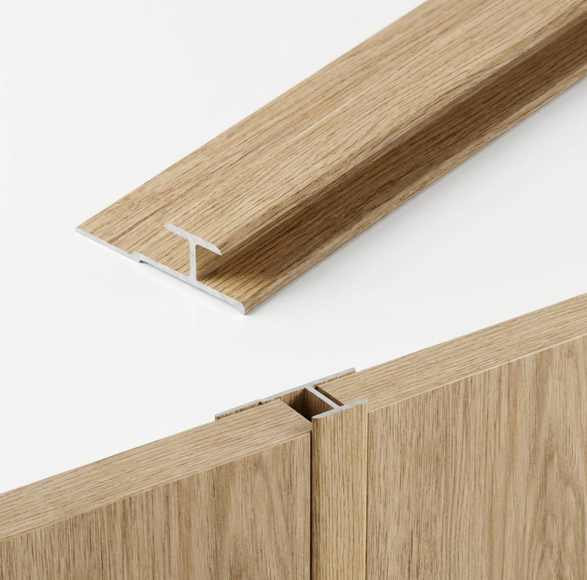 Wood-grain connector trim shown separately and fitted between two white oak veneer wall panels