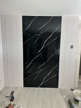 Deep black marble PVC wall panel with white veins, 4x8 ft, UV-protected, fireproof, waterproof, ideal for NJ homes &