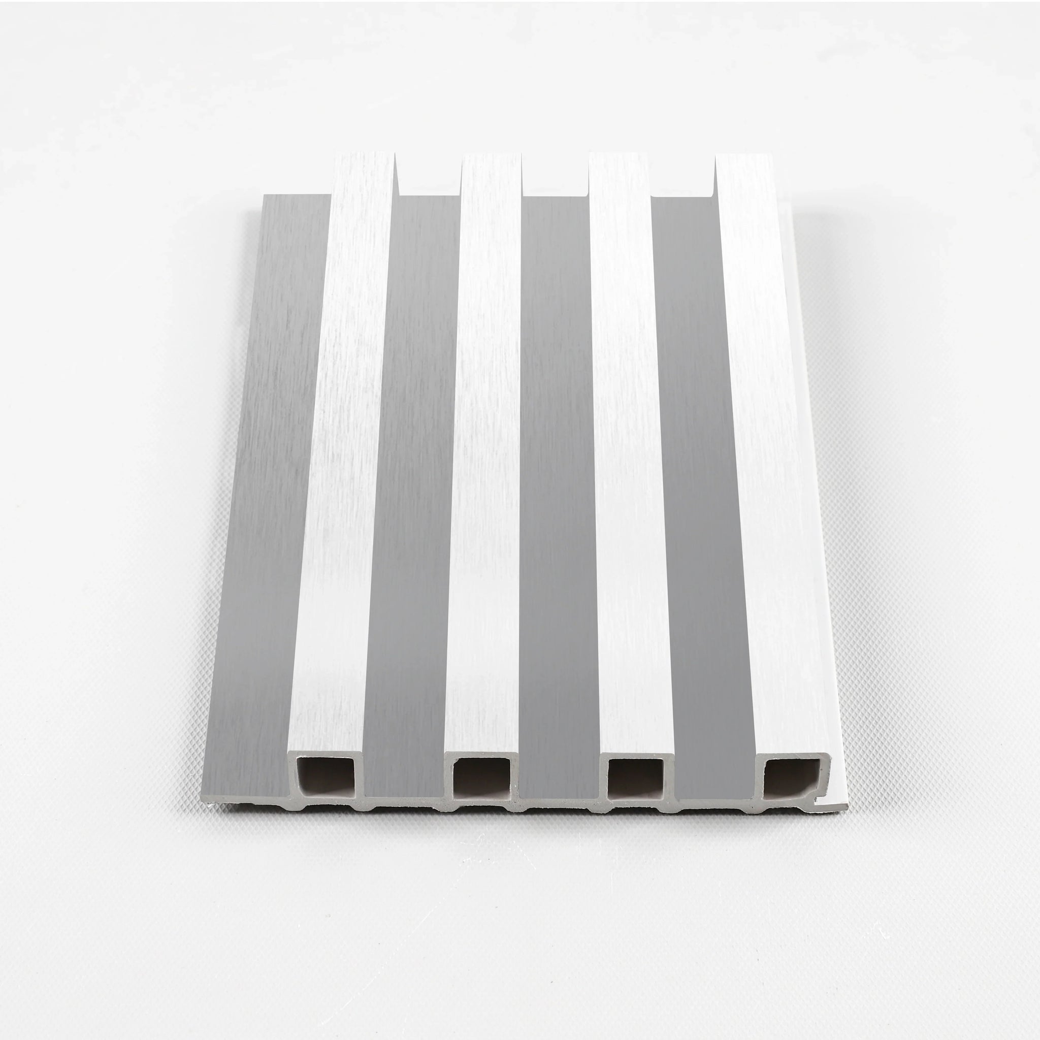 White Brushed Modern WPC fluted wall panel sample with vertical grooves