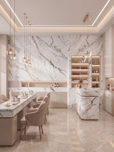 Modern salon with white gray pearl marble-look PVC wall panels and a matching reception counter