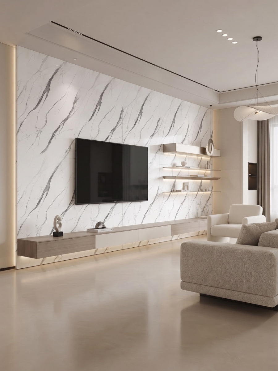 White marble-look PVC panels installed as a veined living room TV feature wall