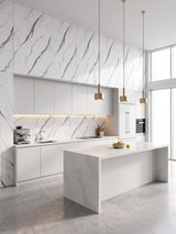 White marble-look PVC wall panels with gray veining installed in a bright modern kitchen