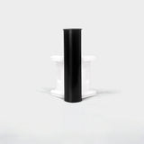Aluminum LED skirting baseboard channel system, 3.3 ft, 4 in height, surface-mounted; black cylinder on white mount.