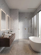 Modern bathroom with ash gray marble-look PVC wall panels surrounding the vanity and walk-in shower