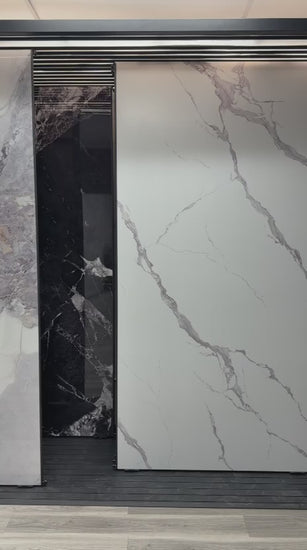 Calacatta Belga PVC marble sheets installed on luxury interior wall, waterproof 4x8 ft