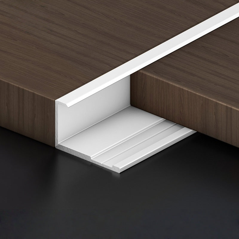 White 3mm aluminum end cap trim fitted along a dark wood-look PVC wall panel edge