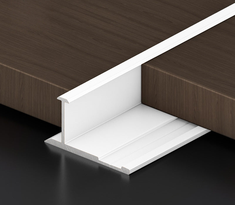 White 3mm aluminum H-joint connection trim positioned between dark wood-look wall panels